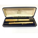 A cased Watermans pen and propelling pencil set.