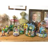 A collection of Disney snowglobes including Monste