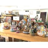 A collection of Disney snowglobes including Dumbo,