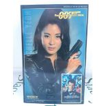 A Boxed Sideshow Collectables Figure From The James Bond Movie Tomorrow Never Dies.