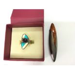 A stylish silver ring and brooch (2). NO RESERVE