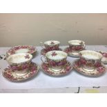 A Royal Albert English bone china tea set The Serena pattern with a perfusion of flowers five cups