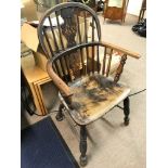 A 19th century Windsor chair 96cm tall 57cm wide