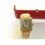 Cartier Tank Française (Reference 2385) luxury ladies' watch. Case and Bracelet 18k yellow gold.