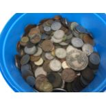 A collection of british coins including pennies, shillings etc also a vintage silver-toned French