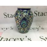19th C Iznik vase and plate vase brightly coloured with floral motifs, plate in floral symmetrical
