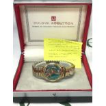 A Bulova Accutron vintage 1964 in original box. Unique calendar on bracelet. Seen working