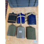 Six WWI water bottles.