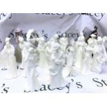 Twenty two figures including Coalport, Worcester, one Lladro one nao