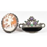 Victorian silver brooch set with a cameo depicting Eros and a silver brooch in an Art Deco style set