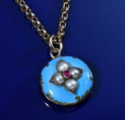 Victorian locket set with a ruby, split pearls and aqua coloured enamel, on Victorian chain made
