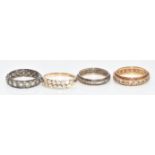 Three 9ct gold rings, comprising one set with cubic zirconia and two eternity rings set with