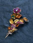 A c1860 18ct gold trembler brooch in the form of a bouquet of flowers, set with twelve natural