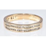 A 9ct gold half eternity ring set with two rows of diamonds, 3.3g, size P