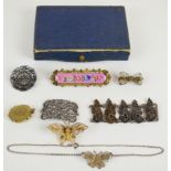 A collection of jewellery including enamel brooch, three silver filigree butterflies, Victorian