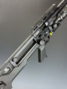 Reximex IXIA .177 PCP carbine air rifle with textured pistol grip, composite skeleton stock, 14 shot