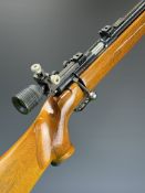 Anschutz Match 54 .22 bolt-action target rifle with chequered grip, raised cheek piece, adjustable