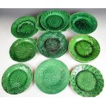 Fourteen pieces of 19thC green majolica table / dessert ware, four impressed Wedgwood including