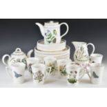 Approximately one hundred pieces of Portmeirion dinner, tea and decorative ware decorated in the