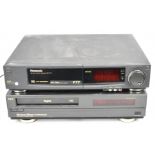Two VHS video cassette recorders comprising Panasonic NV-F77 and NEC PX1200K.