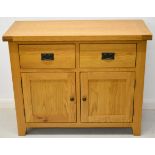 Modern oak sideboard with two drawers above cupboard doors with two shelves within, W105 x D45 x