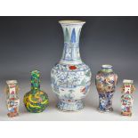 Five Chinese and Japanese vases including including clobbered vase with blue and yellow decoration