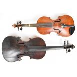 Two 19th century violins comprising full and half size examples.