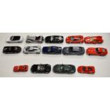 Fourteen mostly 1:18 scale die cast model sports cars to include BMW 325i, Ferrari GTO, Jaguar SS