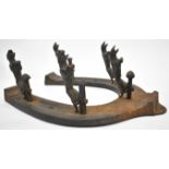 Jaguar motor car interest coat rack formed as a horseshoe mounted with five leaping jaguar car