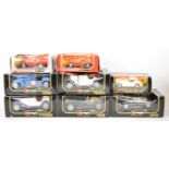 Eight Bburago 1:18 and 1:24 scale diecast model sports cars comprising Ferrari 250 GTO, Jaguar XK