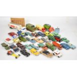 Thirty four vintage Dinky Toys diecast model cars, trucks and military vehicles to include