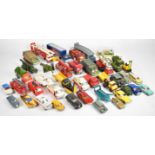 A collection of vintage Dinky Toys diecast model cars, trucks and military vehicles to include