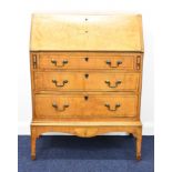 Georgian inlaid satinwood bureau on stand of small proportions, with graduated drawers, fitted