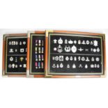 Three framed displays including 'British Campaign and Gallantry Medals' and two 'The Military
