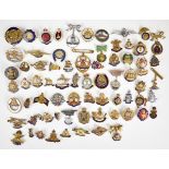Approximately seventy WW1, WW2 and similar sweetheart brooches / pin badges, most regimental with