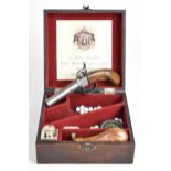 Unnamed percussion hammer action pocket pistol with wooden grips and 3 inch smooth bored barrel,