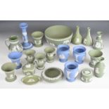 Wedgwood pale blue and green Jasperware including trinket / pin dishes, vases, oval platter,