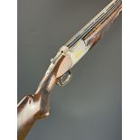 Browning 325 Grade 6 12 bore over and under ejector shotgun with gold inlaid dogs and birds to the