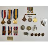 Family medal group comprising WW1 medal trio comprising 1914-15 Star, British War Medal and