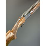 Perazzi MX7 12 bore over under ejector shotgun with chequered semi-pistol grip and forend, vented