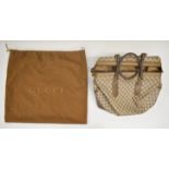 Vintage Gucci GG supreme travel tote in the iconic beige GG canvas with brown leather trim, with