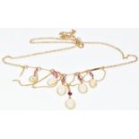 A 9ct gold necklace set with oval cut pink sapphires and six opal cabochons, 5.2g, 45cm