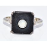 Art Deco 18ct white gold ring set with an onyx plaque and opal, 3.3g, size M