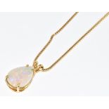 An 18ct gold pendant set with a pear cut opal of approximately 2.7ct, on 18ct gold chain, 11.8g,