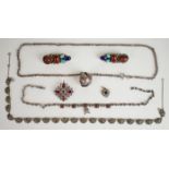 A collection of silver jewellery including necklace set with foiled garnets, marcasite necklace,