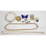 A collection of silver jewellery including bamboo bangle, brooch, malachite ring, necklace,
