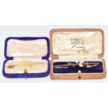 A 9ct gold brooch set with sapphires and blister pearls (4g, 6cm), and a Victorian stick pin, both