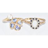 Two 9ct gold rings, one set with an opal surrounded by diamonds and sapphires and the other set with