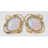 A pair of 9ct gold earrings set with opals made by Hooper Bolton, 3.4g