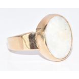 A 9ct gold ring set with an white opal, 6.7g, size Y